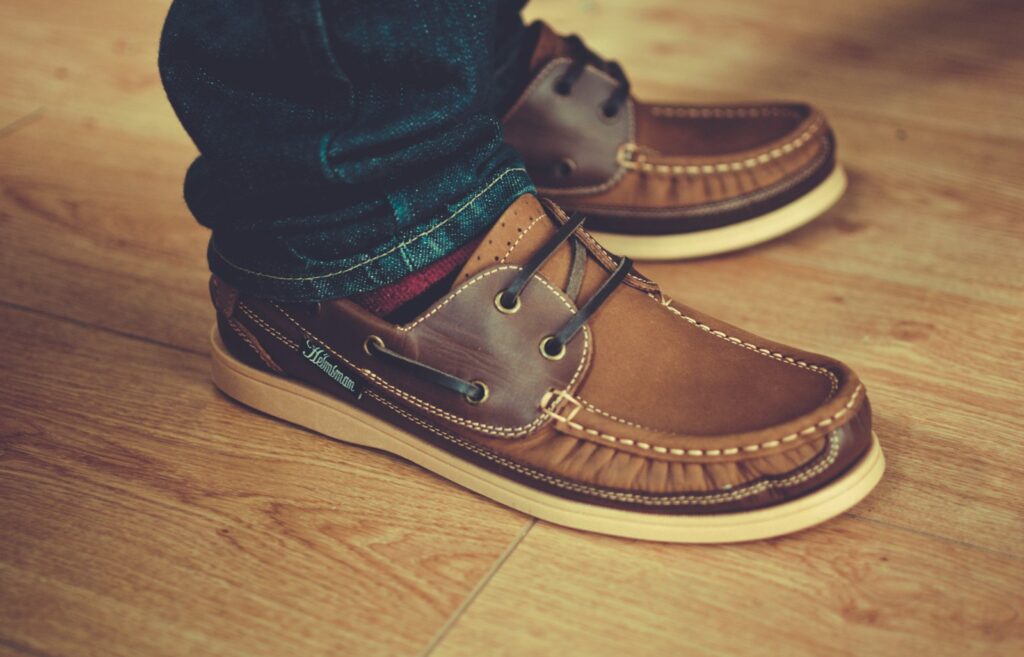 Man wearing brown leather casual loafers