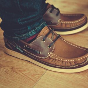 Man wearing brown leather casual loafers